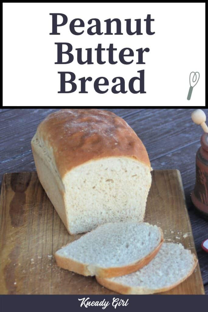 A loaf of peanut butter bread on a board with slices.