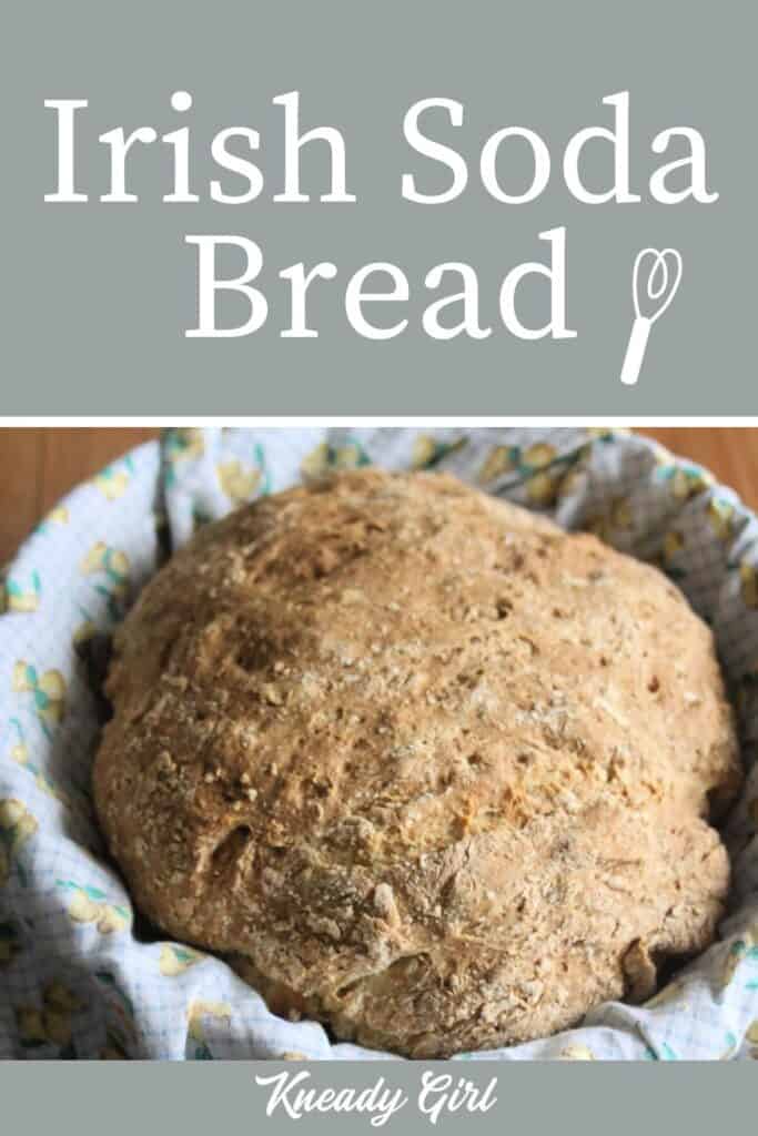 A loaf of Irish Soda Bread in a linen lined basket with text overlay.