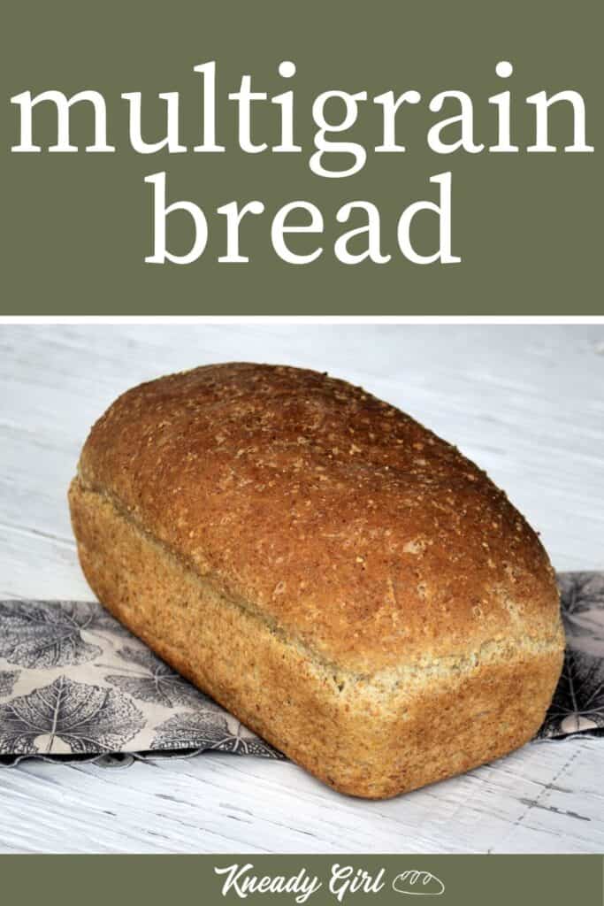 A loaf of multigrain bread on a napkin with text overlay.