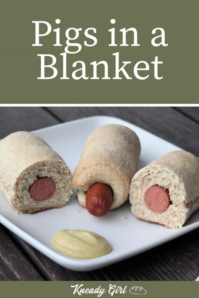 Pigs in a blanket on a white plate with mustard and text overlay.