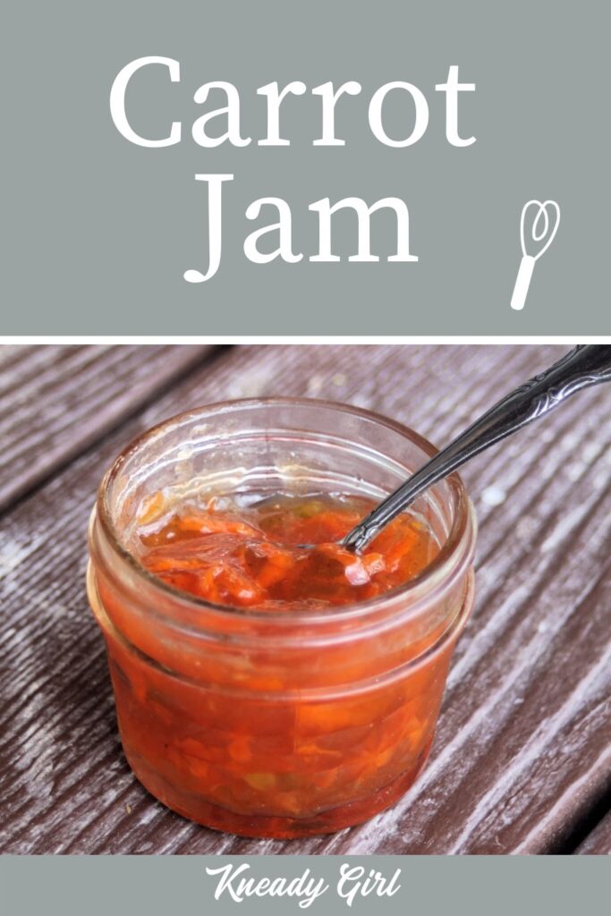 An open jar of carrot jam with spoon sticking out of it and text overlay. 