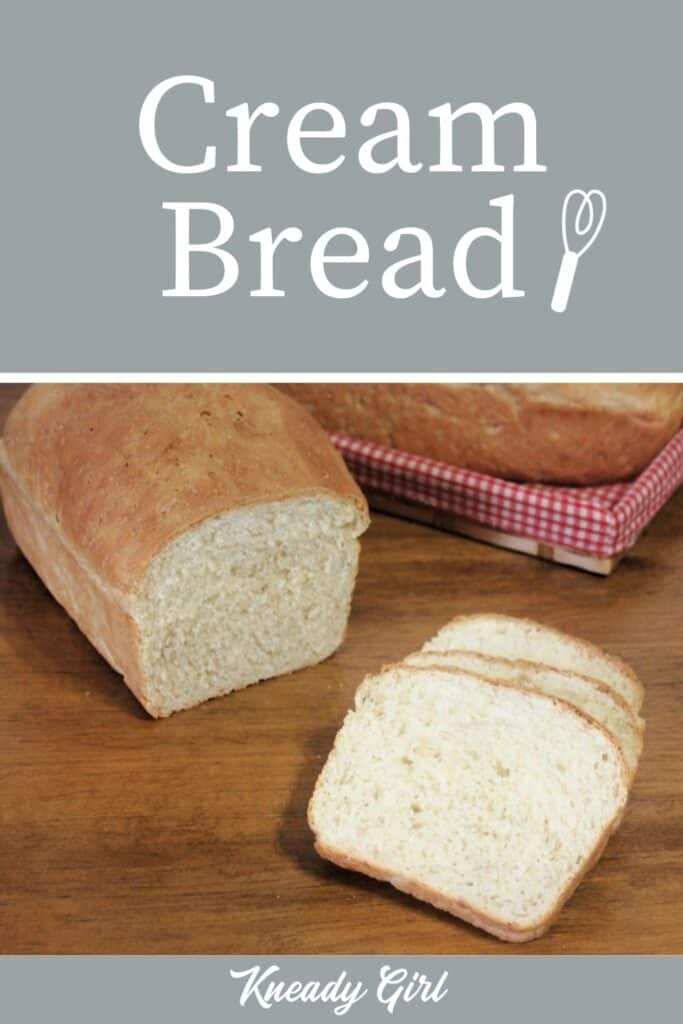 Slices of cream bread on a table sitting in front of the rest of the loaf with another loaf in a basket in the background with text overlay stating: Cream Bread.