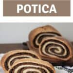 Slices of potica on a white plate sitting on top of a floral table runner with remaining loaf in the background with text overlay stating: serbian nut bread potica.