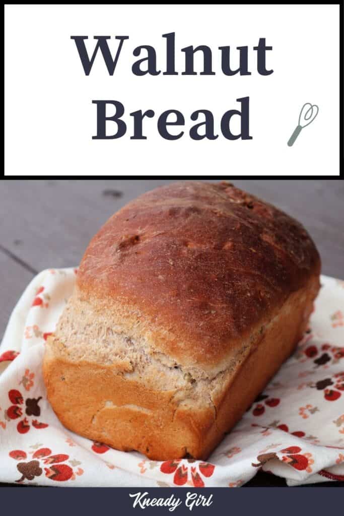 A loaf of bread sitting on a printed napkin with text overlay stating: walnut bread.