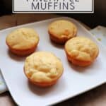 4 muffins on a square white plate with text overlay reading: lightly sweet pineapple muffins.