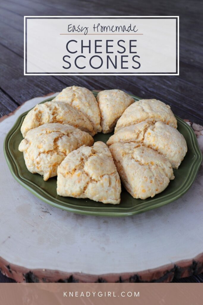 A ring of scones sitting on a green plate. Text overlay reads: Easy Homemade Cheese Scones.