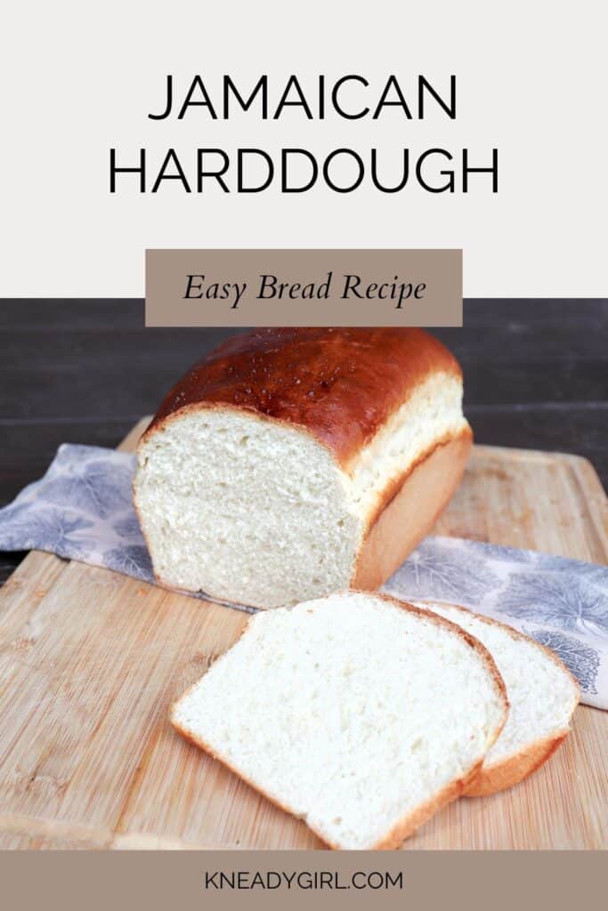 Slices of white bread sit on a board with remaining loaf siting on a cloth behind them. Text overlay reads: Jamaican Harddough Easy Bread Recipe.