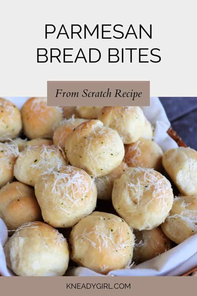 A linen lined basket full of bread balls covered in grated parmesan cheese. Text Overlay reads: Parmesan Bread Bites - From Scratch Recipe.