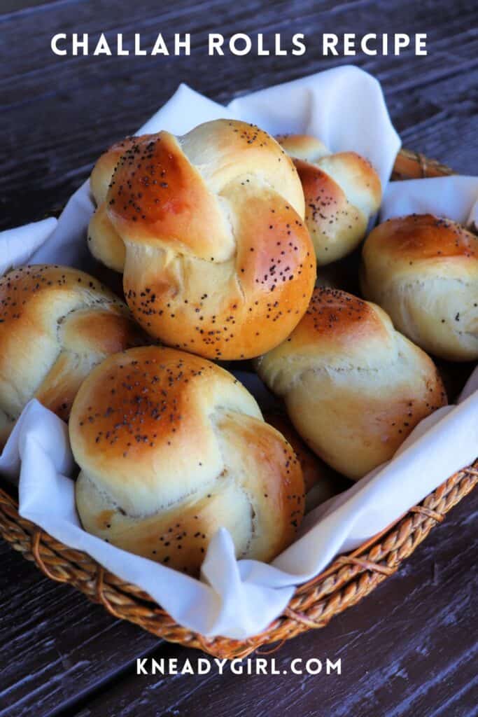 A basket of poppy seed topped rolls with text overlay stating: Challah Rolls Recipe.