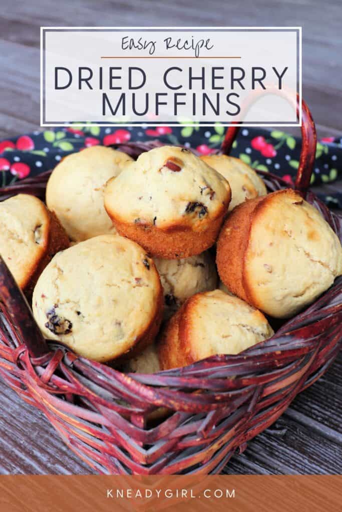 A basket of dried cherry muffins sits on a table. Text overlay reads: Easy Recipe - Dried Cherry Muffins.